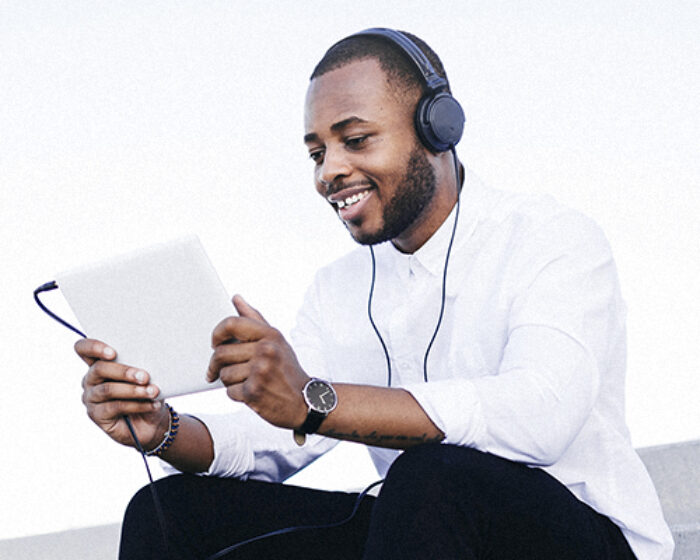 Man looking at tablet