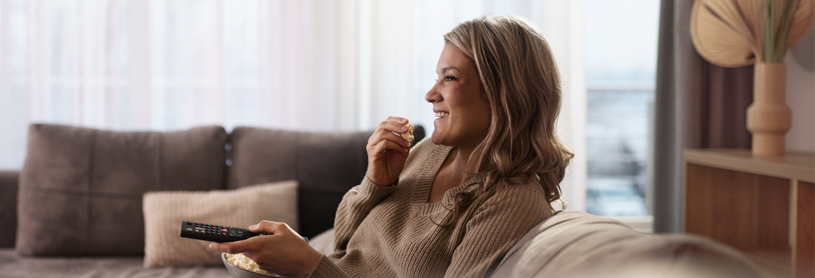 French woman watching TV