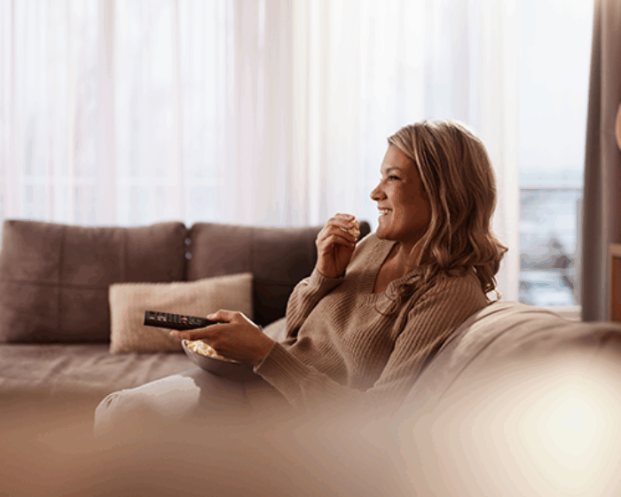 French woman watching TV