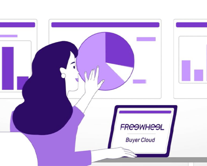 Woman using FreeWheel Buyer Cloud