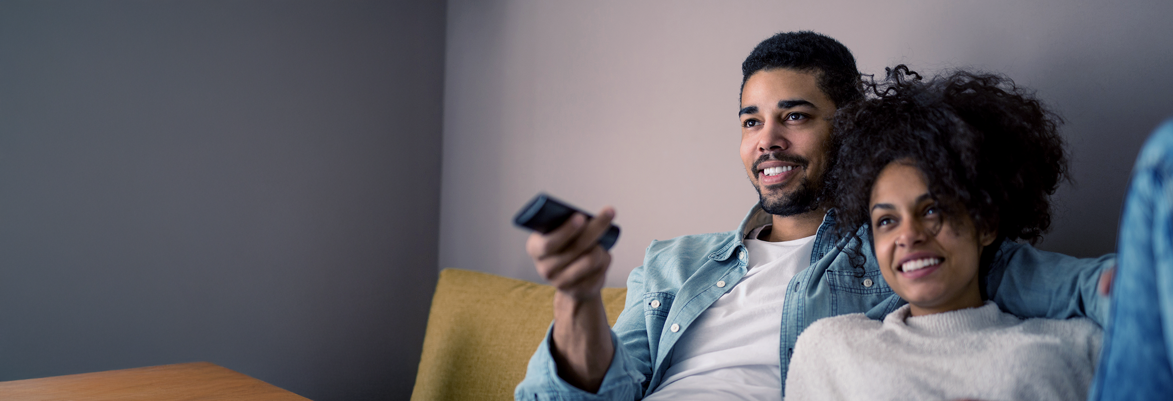 A couple watching TV