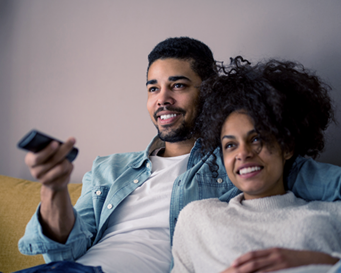 A couple watching TV