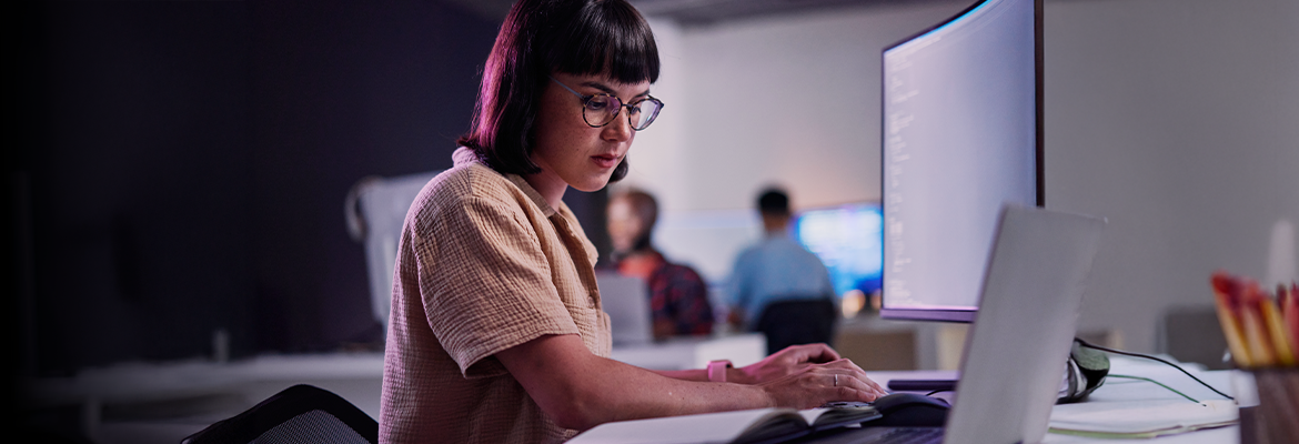 Woman working in office on computer