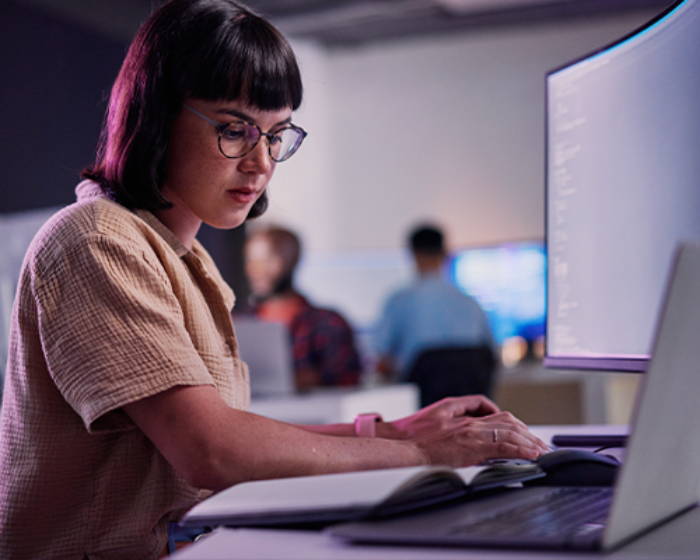 Woman working in office on computer