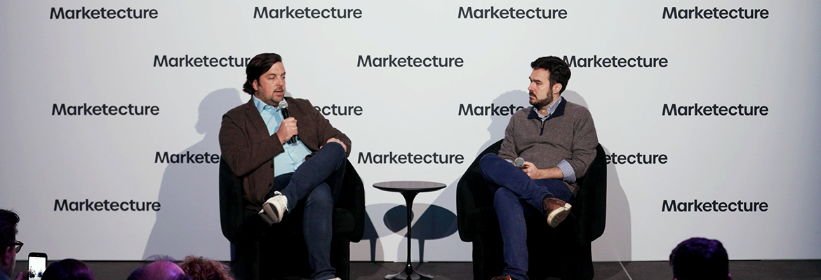 Speakers on stage at event