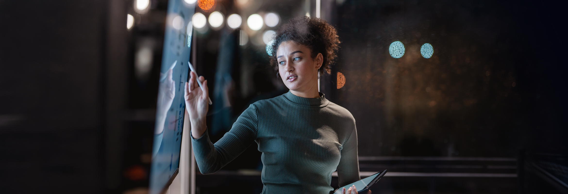 Woman presenting data in an office